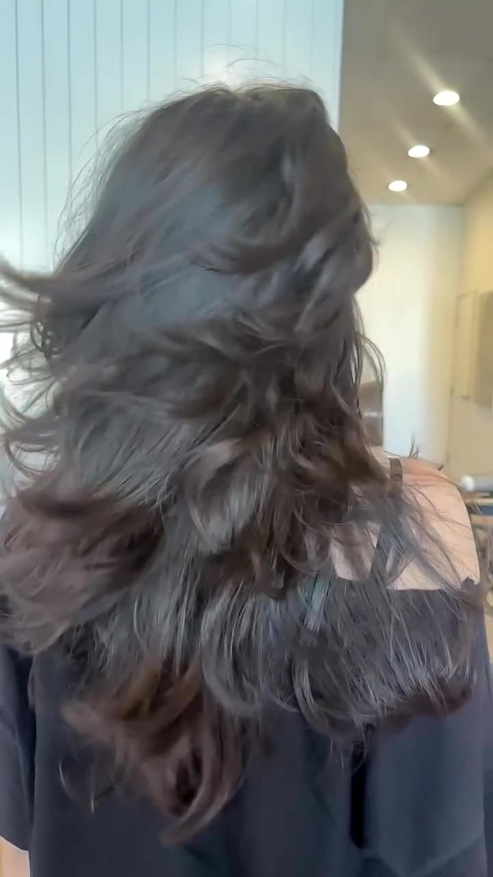 Polished layered hair by D'Luxe